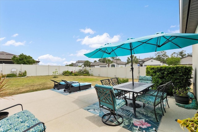 view of patio / terrace featuring outdoor dining area and a fenced backyard