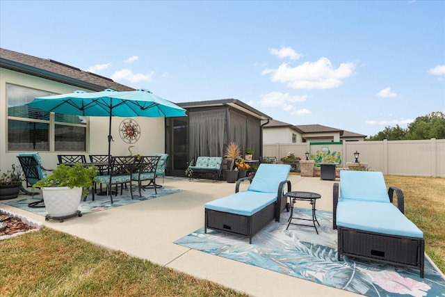 view of patio / terrace with fence