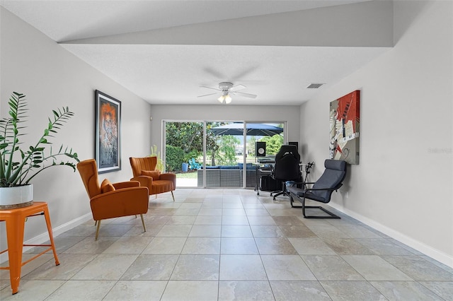 11908 Delfina Ln, Orlando, FL 32827 - living area with light tile patterned floors, visible vents, baseboards, and a ceiling fan