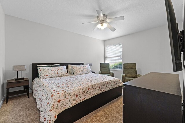 11908 Delfina Ln, Orlando, FL 32827 - bedroom featuring carpet flooring, baseboards, and ceiling fan