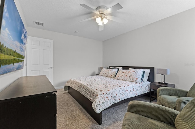 11908 Delfina Ln, Orlando, FL 32827 - bedroom with a ceiling fan, baseboards, visible vents, and carpet