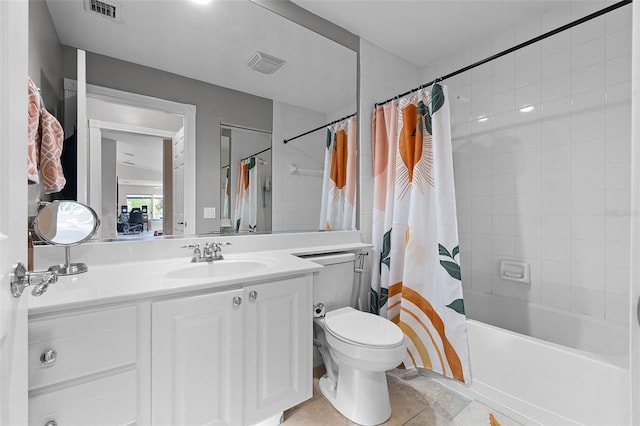 11908 Delfina Ln, Orlando, FL 32827 - bathroom featuring shower / bath combo with shower curtain, toilet, visible vents, and vanity
