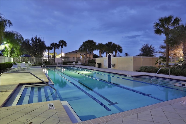 11908 Delfina Ln, Orlando, FL 32827 - community pool featuring fence