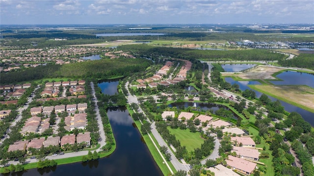 11908 Delfina Ln, Orlando, FL 32827 - aerial view featuring a water view and a residential view