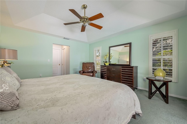 8202 Shadow Pine Way, Sarasota, FL 34238 - bedroom with carpet floors, a tray ceiling, a ceiling fan, and baseboards