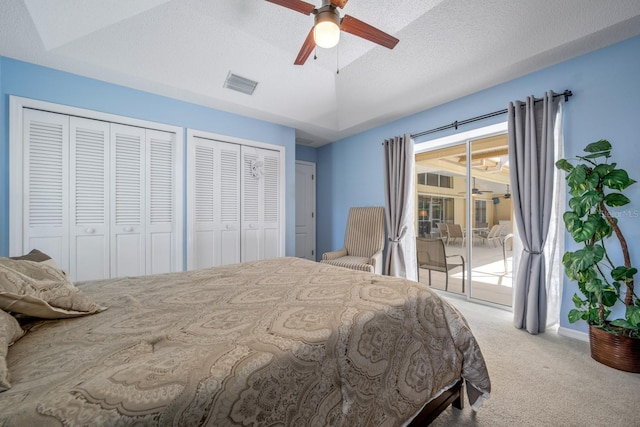8202 Shadow Pine Way, Sarasota, FL 34238 - bedroom featuring access to outside, carpet flooring, multiple closets, lofted ceiling, and ceiling fan