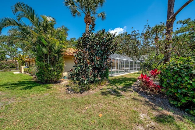 8202 Shadow Pine Way, Sarasota, FL 34238 - view of grassy yard with a lanai