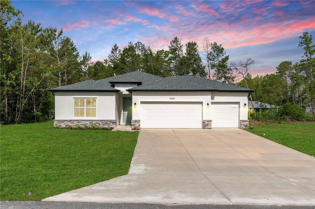 13068 SW 36th Ct, Ocala, FL 34473 - prairie-style house featuring stone siding, stucco siding, and an attached garage