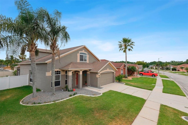 29704 Eagle Station Dr, Wesley Chapel, FL 33543 - view of front facade with stucco siding, concrete driveway, and an attached garage