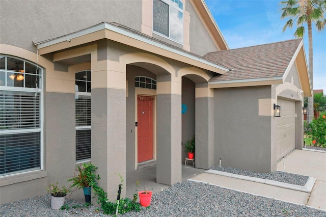 29704 Eagle Station Dr, Wesley Chapel, FL 33543 - entrance to property with concrete driveway, stucco siding, a shingled roof, and an attached garage