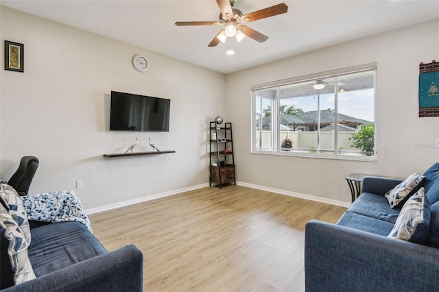 29704 Eagle Station Dr, Wesley Chapel, FL 33543 - living area featuring wood finished floors, baseboards, ceiling fan, and recessed lighting