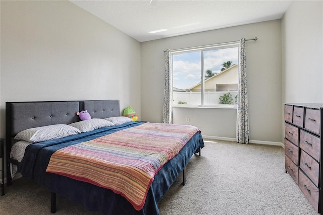 29704 Eagle Station Dr, Wesley Chapel, FL 33543 - bedroom featuring baseboards and carpet floors