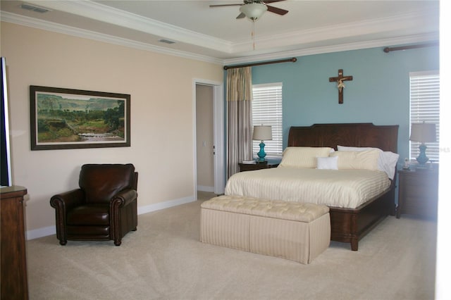 carpeted bedroom with visible vents, ornamental molding, and baseboards
