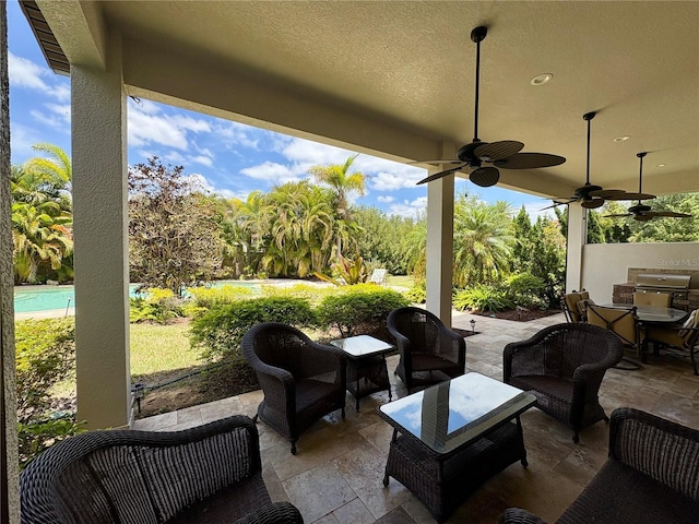 view of patio / terrace with a ceiling fan
