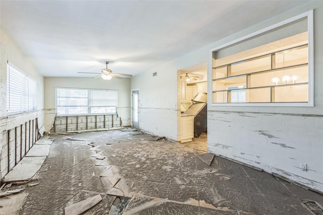 15406 2nd St E, Madeira Beach, FL 33708 - spare room featuring ceiling fan and visible vents