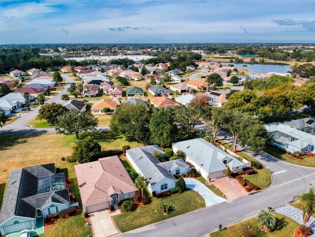aerial view with a residential view and a water view