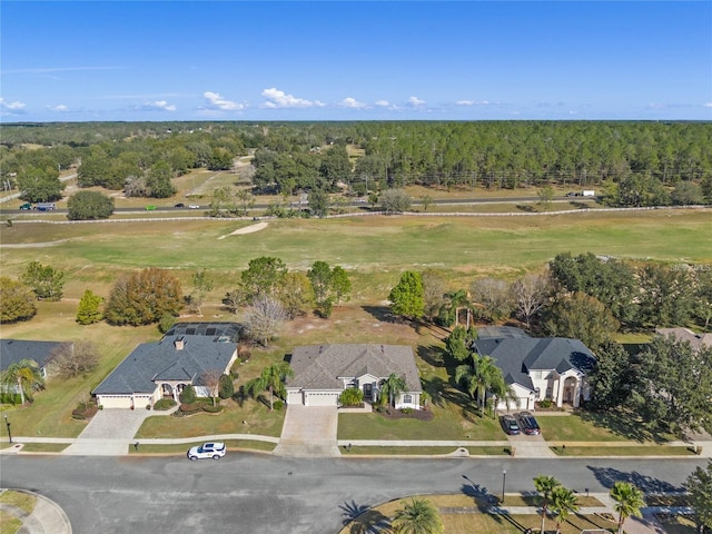 23533 Valderama Ln, Sorrento, FL 32776 - birds eye view of property featuring view of golf course and a forest view