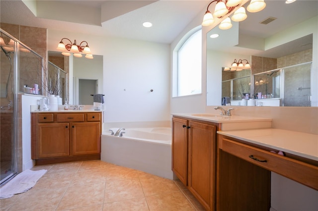 23533 Valderama Ln, Sorrento, FL 32776 - full bathroom with tile patterned flooring, a notable chandelier, a shower stall, and a garden tub