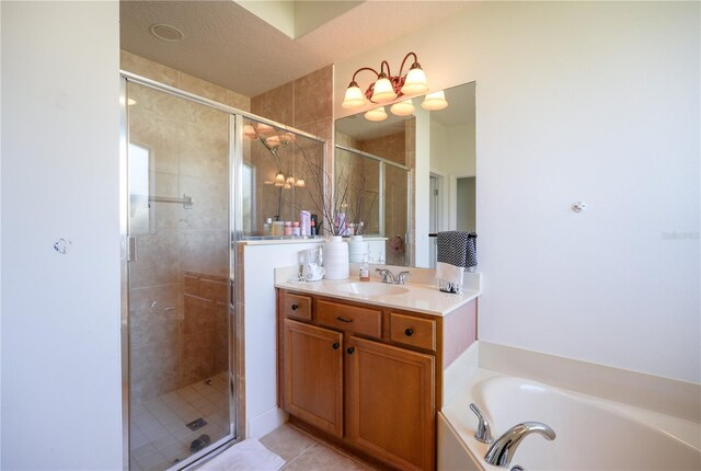 23533 Valderama Ln, Sorrento, FL 32776 - full bathroom with vanity, a shower stall, tile patterned floors, and a garden tub