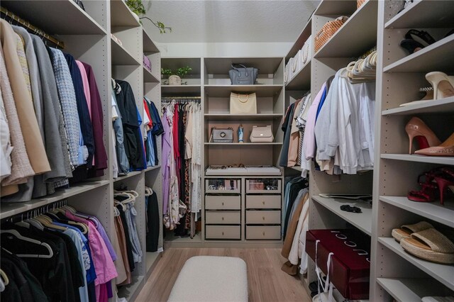 23533 Valderama Ln, Sorrento, FL 32776 - spacious closet featuring light wood-style flooring