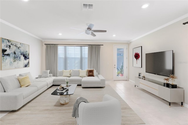 living area with crown molding, a ceiling fan, visible vents, and recessed lighting