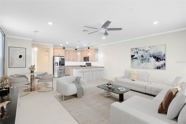 living room featuring a ceiling fan, visible vents, crown molding, light tile patterned floors, and recessed lighting