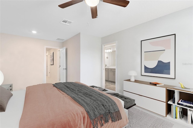 bedroom with a ceiling fan, visible vents, ensuite bathroom, and recessed lighting