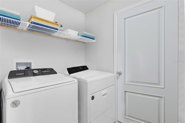 laundry room featuring laundry area and washing machine and dryer