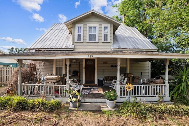 419 Palm Ave, Eustis, FL 32726 - view of front of property with covered porch and metal roof