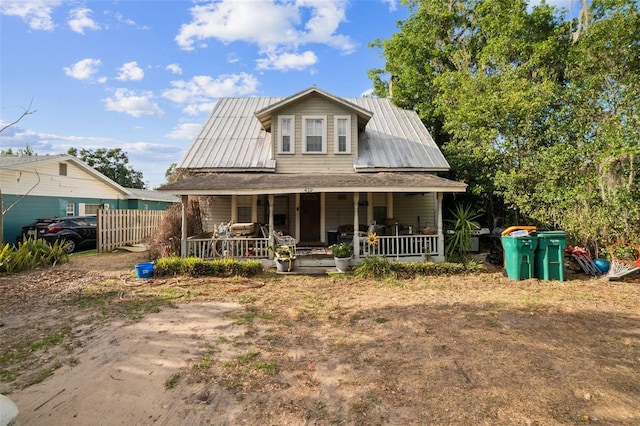 419 Palm Ave, Eustis, FL 32726 - rear view of property with a porch and metal roof