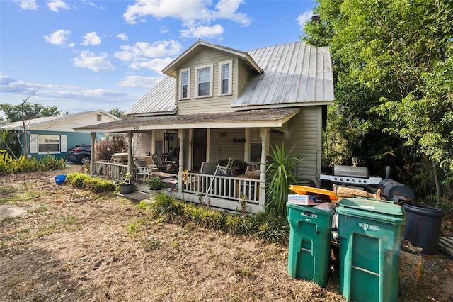 419 Palm Ave, Eustis, FL 32726 - view of front of property with covered porch and metal roof