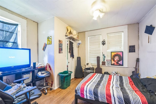 419 Palm Ave, Eustis, FL 32726 - bedroom with hardwood / wood-style flooring