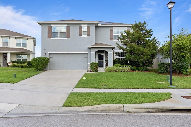 4054 Silverstream Ter, Sanford, FL 32771 - traditional home with a garage, stucco siding, a front yard, solar panels, and driveway