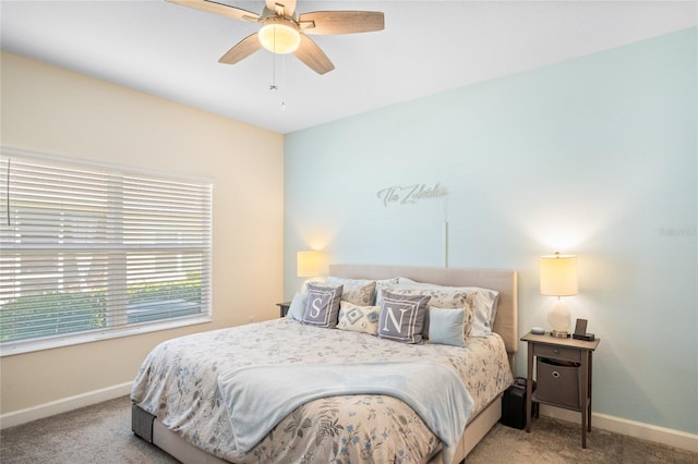 bedroom featuring carpet floors, baseboards, and ceiling fan