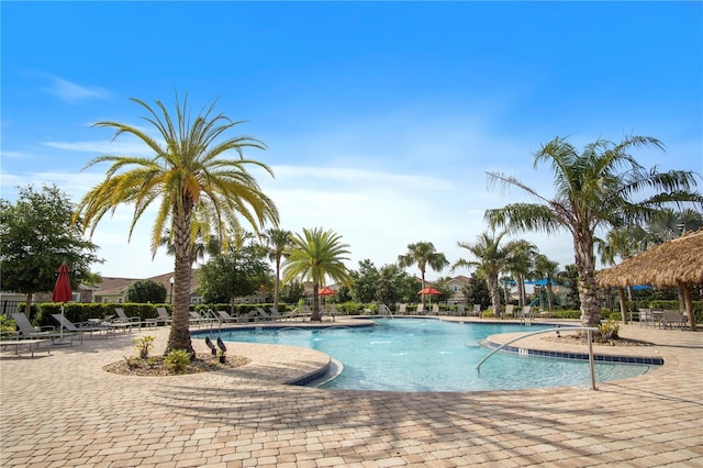 community pool featuring a patio area