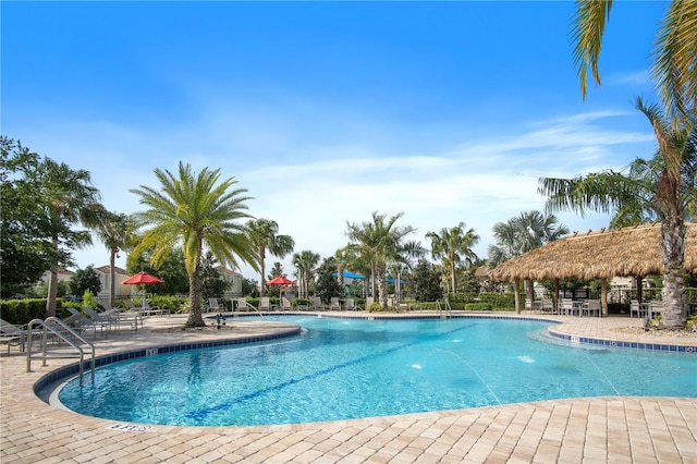 pool featuring a gazebo and a patio