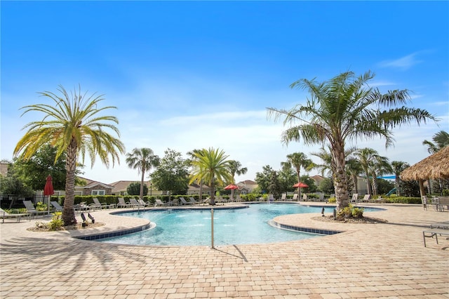pool with a patio area