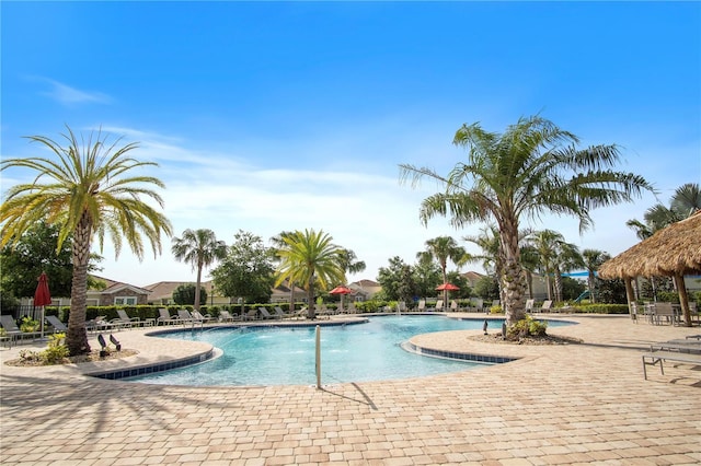 community pool featuring a patio and a gazebo