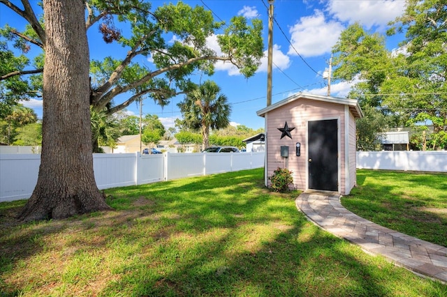 view of yard with a storage unit and an outdoor structure