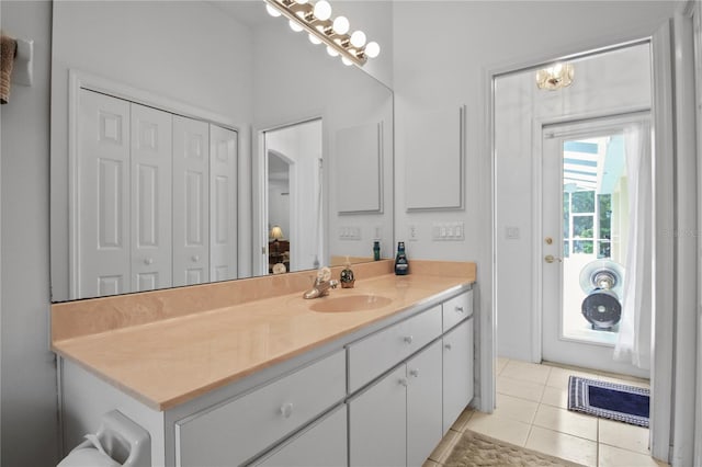 bathroom featuring tile patterned floors and vanity