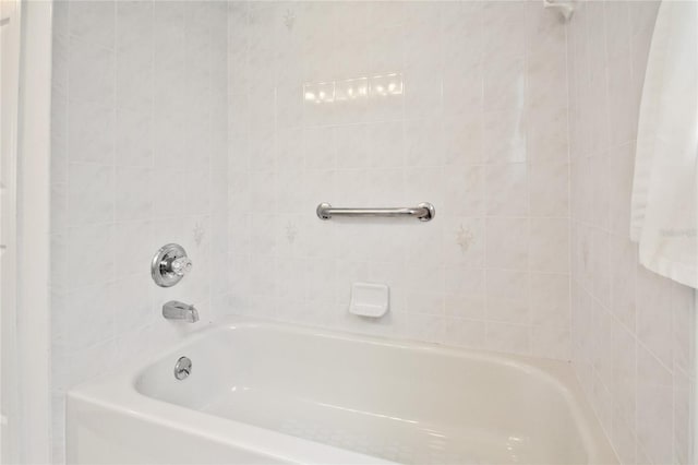 bathroom featuring  shower combination