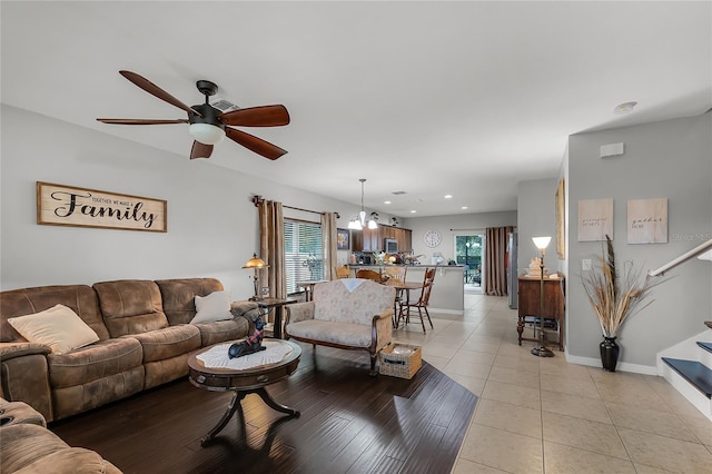 913 Bending Oak Trl, Winter Garden, FL 34787 - living room with ceiling fan, a chandelier, light tile patterned floors, recessed lighting, and baseboards