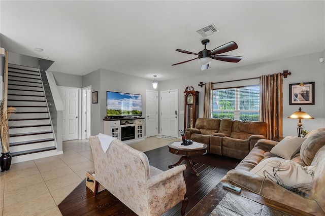 913 Bending Oak Trl, Winter Garden, FL 34787 - living area with stairs, ceiling fan, and light tile patterned flooring