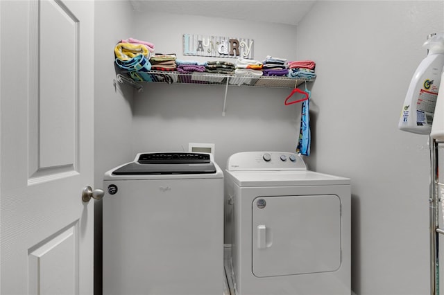 913 Bending Oak Trl, Winter Garden, FL 34787 - laundry area featuring washing machine and dryer