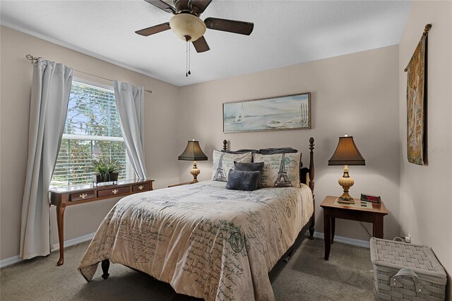 913 Bending Oak Trl, Winter Garden, FL 34787 - bedroom with carpet flooring, baseboards, and a ceiling fan