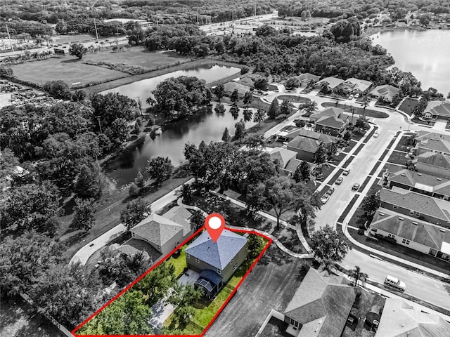 913 Bending Oak Trl, Winter Garden, FL 34787 - aerial view of residential area featuring a large body of water and property boundaries highlighted