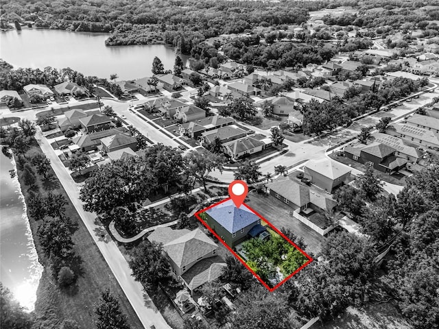 913 Bending Oak Trl, Winter Garden, FL 34787 - aerial view of residential area with a nearby body of water, property boundaries highlighted, and a forest