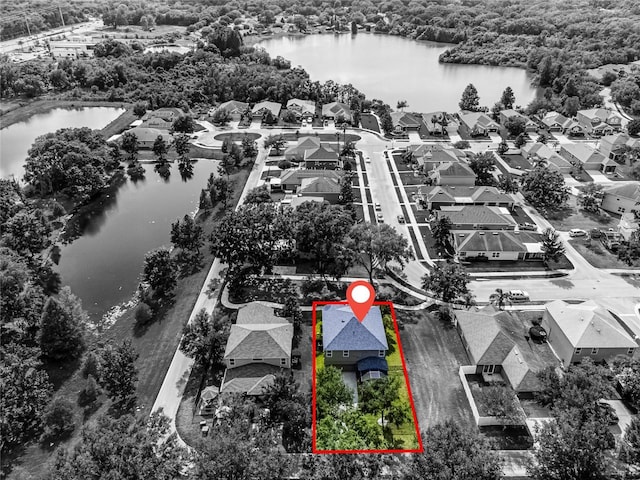 913 Bending Oak Trl, Winter Garden, FL 34787 - aerial perspective of suburban area with a nearby body of water, property boundaries highlighted, and a forest