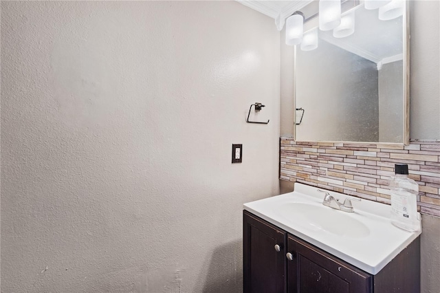 114 Shaddock Dr, Auburndale, FL 33823 - bathroom with vanity, ornamental molding, and tasteful backsplash