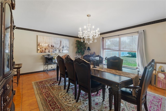 114 Shaddock Dr, Auburndale, FL 33823 - dining room featuring baseboards, ornamental molding, light tile patterned flooring, and a notable chandelier